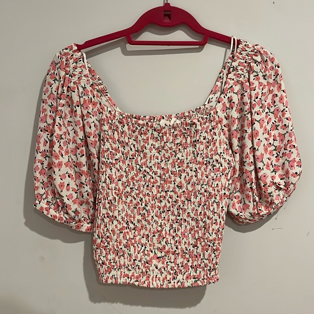 Formal floral top, pink with puffy sleeves.